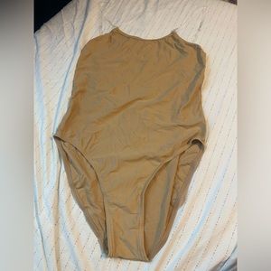 Never worn nude leotard women’s size XL NIB